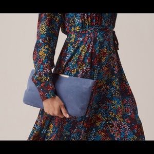 powder blue suede clutch bag